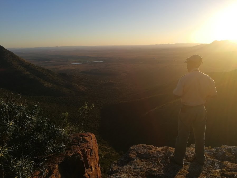 Julius looks out over the Plains of Camdeboo, Samara Private Game Reserve, Great Karoo, South Africa